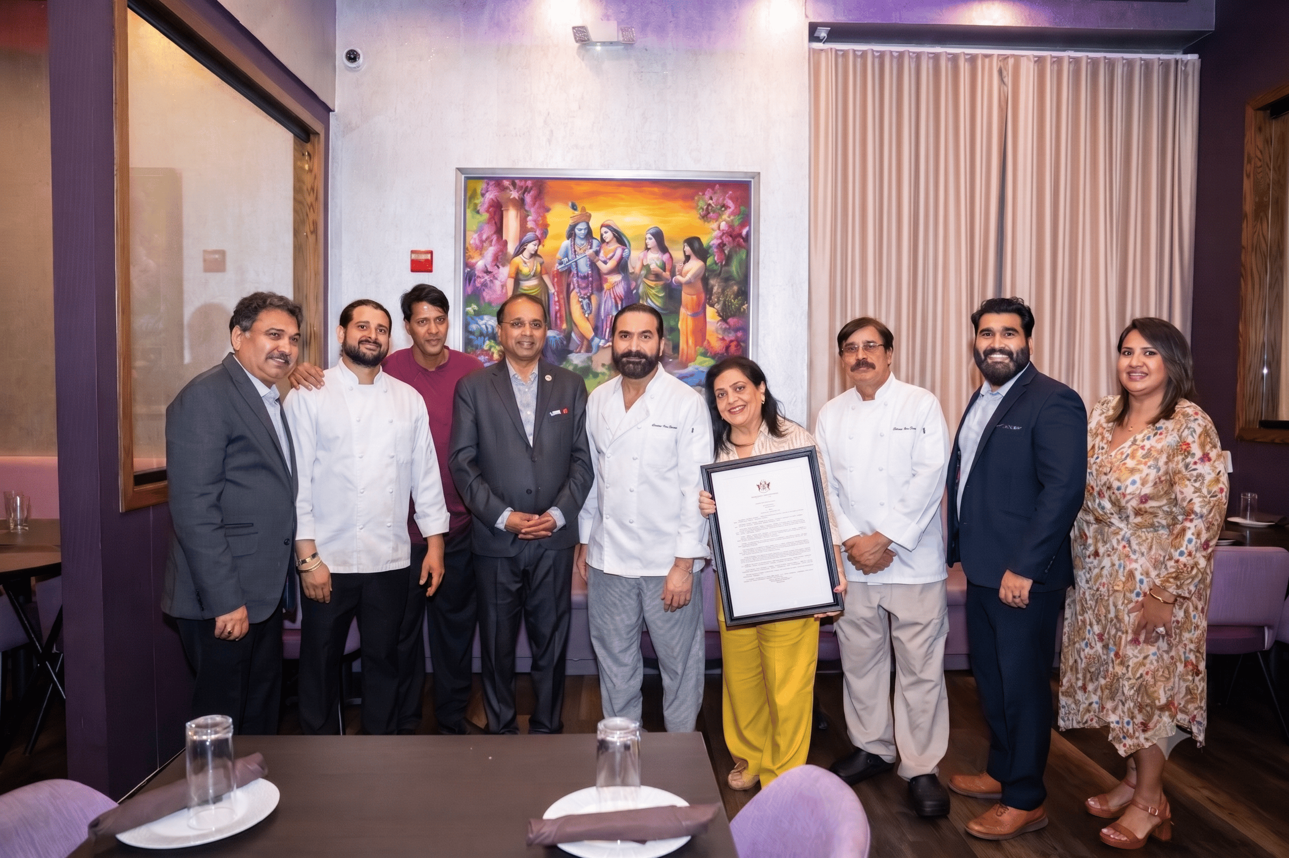 Chef Rupa Vira and the culinary team at Celebration by Rupa Vira with Senator Kannan Srinivasan holding Virginia Senate Resolution No. 158, Ashburn VA